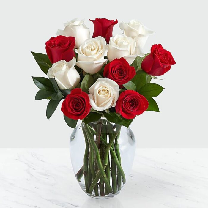 Dozen White and Red Roses with Greenery in Vase